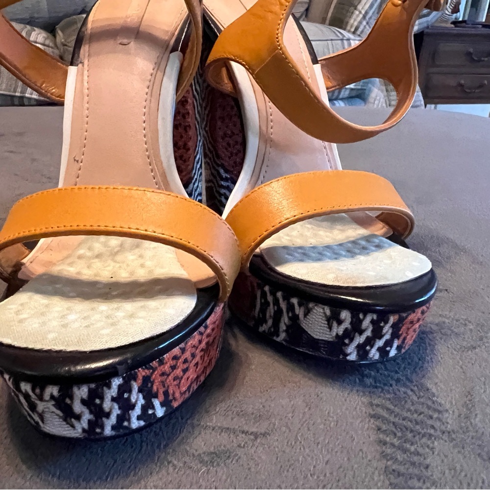 Aldo Black and Orange Platform Shoes with Perforated Uppers